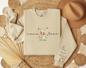 Custom mama sweatshirt with her kids name printed on sleeve and her est year