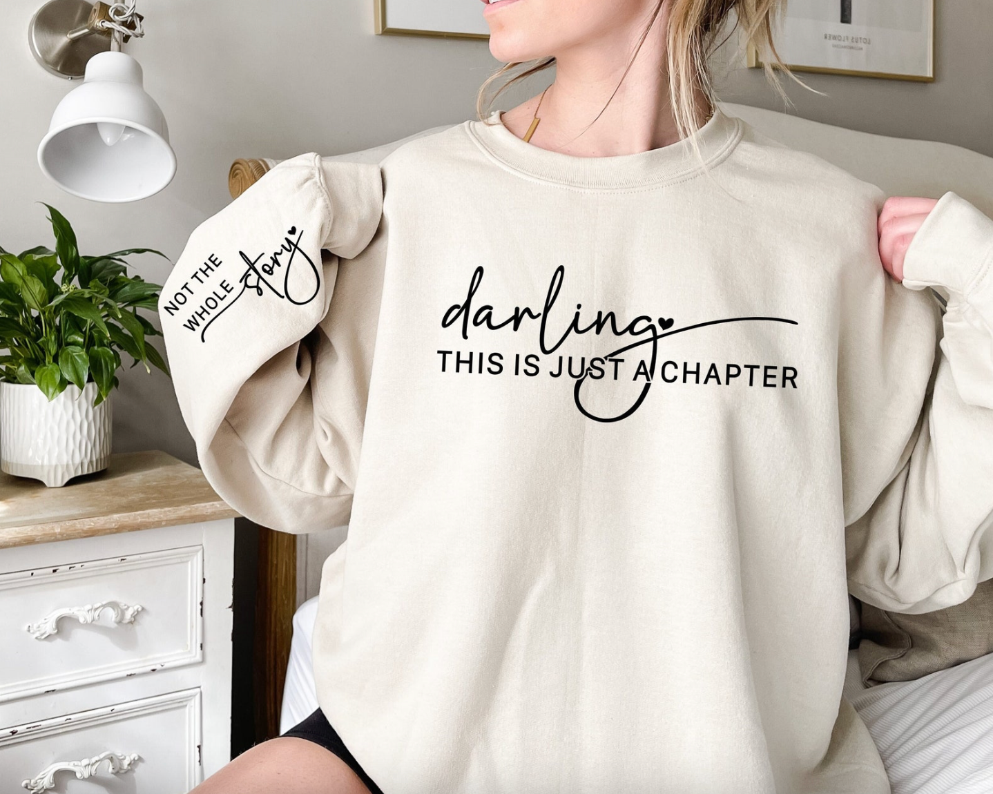 Sweatshirt mit Ärmelaufdruck „Das ist nur ein Kapitel, nicht die ganze Geschichte“